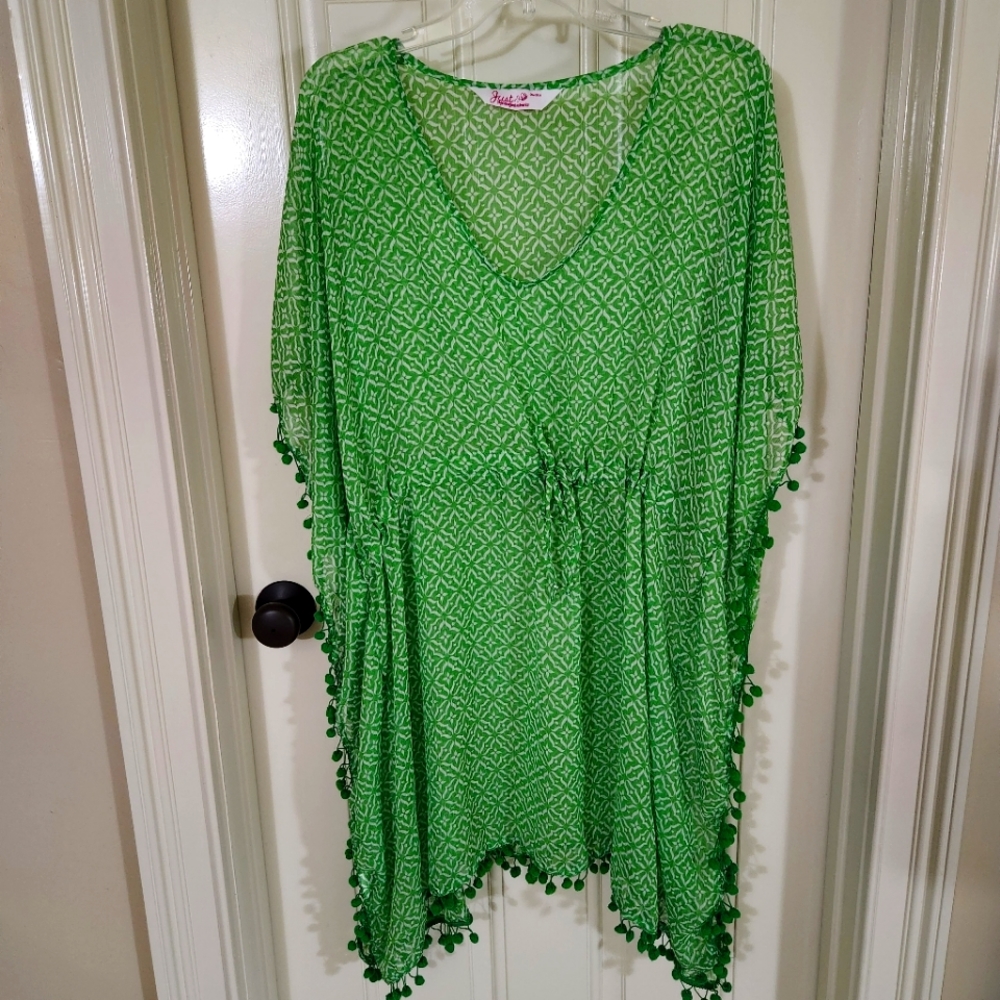Like new swimsuit cover.  Excellent condition.